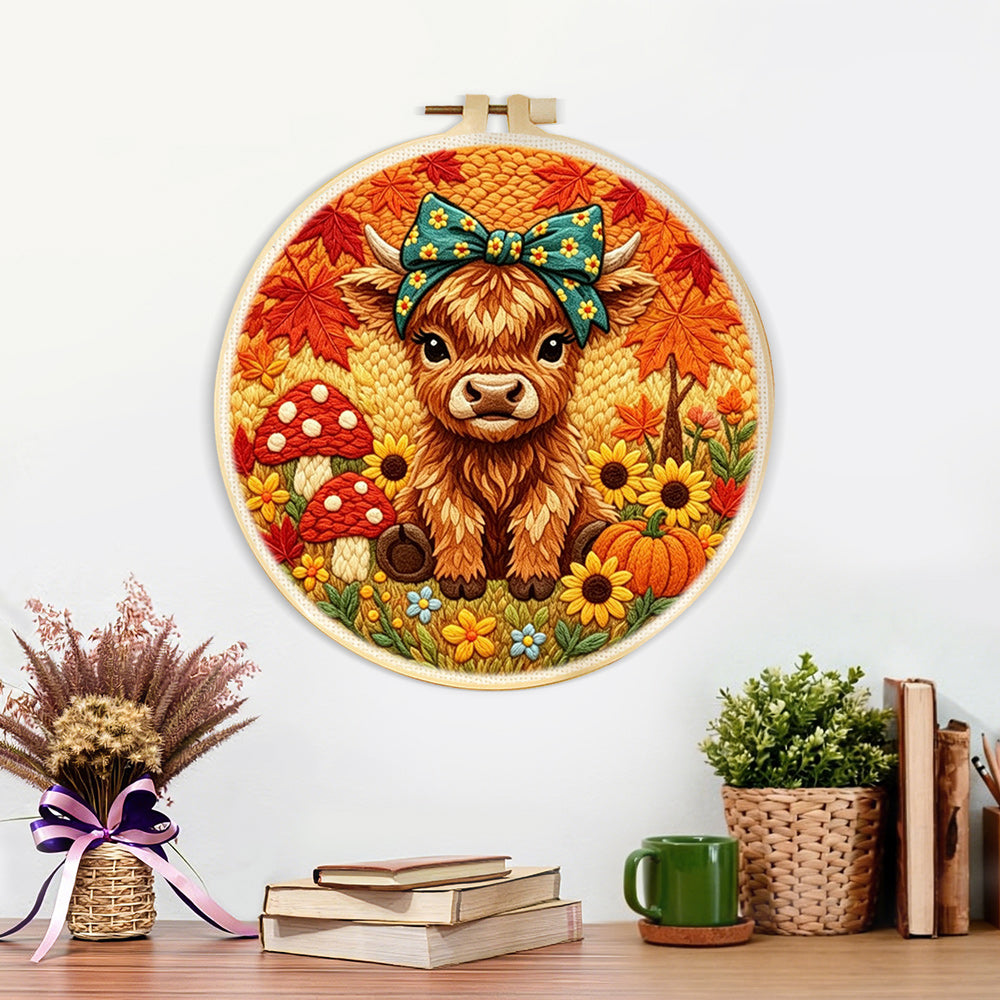 Finished  autumn harvest highland cow artwork displayed on a wall
