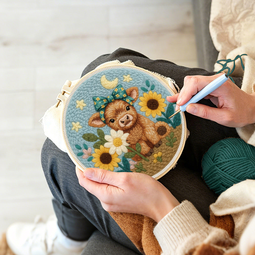 Creating handmade  baby highland cow and sunflowers punch needle artwork